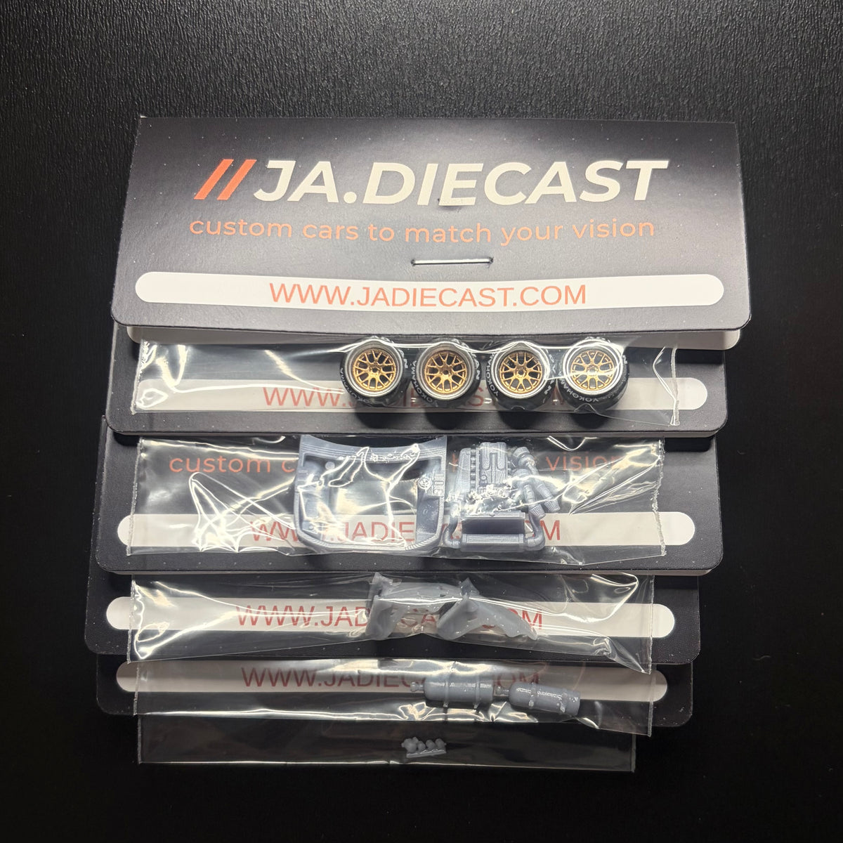 5 pack of rims and parts for hot wheels and match box